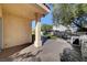 Covered back patio with a built-in barbecue grill, offering an ideal outdoor space for entertainment and relaxation at 4936 Mountain Foliage Dr, Las Vegas, NV 89148
