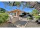 Beautiful backyard with a built-in barbecue and mature landscaping, providing a tranquil setting at 4936 Mountain Foliage Dr, Las Vegas, NV 89148