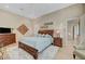 Bright bedroom featuring high ceilings, ceiling fan, and plush rug at 4936 Mountain Foliage Dr, Las Vegas, NV 89148