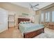 Bedroom with ensuite bathroom, high ceilings, fan, and walk-in closet at 4936 Mountain Foliage Dr, Las Vegas, NV 89148
