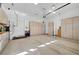Spacious garage with ample storage cabinets and high ceilings, providing plenty of room for vehicles and projects at 4936 Mountain Foliage Dr, Las Vegas, NV 89148