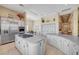 Spacious kitchen with granite countertops, stainless steel appliances, and multiple cooking islands for ultimate convenience at 4936 Mountain Foliage Dr, Las Vegas, NV 89148