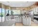 Bright kitchen boasts granite counters, stainless appliances, and custom cabinetry, offering style and function at 4936 Mountain Foliage Dr, Las Vegas, NV 89148