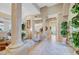 Open-concept living room featuring neutral tones, elegant columns, and natural lighting at 4936 Mountain Foliage Dr, Las Vegas, NV 89148