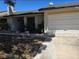 Charming single-story home featuring a well-manicured front yard and attached garage at 5612 Pearldrop Ave, Las Vegas, NV 89107