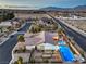 Overhead perspective of the property highlighting the outdoor living spaces with a pool, and backyard at 5640 Willow Canyon St, Las Vegas, NV 89149