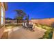 Inviting backyard with comfortable seating, lush greenery, and a serene ambiance perfect for outdoor relaxation at 5640 Willow Canyon St, Las Vegas, NV 89149