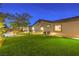 Beautiful backyard with well-maintained lawn at 5640 Willow Canyon St, Las Vegas, NV 89149