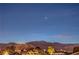 Distant mountains rise majestically over cityscape at 5640 Willow Canyon St, Las Vegas, NV 89149