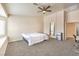 Bedroom with ceiling fan and doorway to the Primary bathroom at 6217 Statue St, North Las Vegas, NV 89081