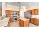 This bright, modern kitchen has stainless steel appliances, beautiful countertops, and ample cabinet space at 6217 Statue St, North Las Vegas, NV 89081