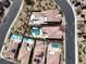 Aerial view outlining the property with a pool, spa, patio, and manicured landscaping at 640 Hayborn Meadows St, Las Vegas, NV 89138