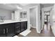 Modern bathroom with double vanity and neutral color scheme at 640 Hayborn Meadows St, Las Vegas, NV 89138