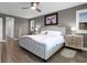 Spacious bedroom with a king bed, side tables, and bright windows at 640 Hayborn Meadows St, Las Vegas, NV 89138