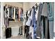 Walk-in closet featuring hanging clothes and storage space at 640 Hayborn Meadows St, Las Vegas, NV 89138