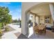 Inviting covered patio featuring comfortable seating and a peaceful ambiance at 640 Hayborn Meadows St, Las Vegas, NV 89138