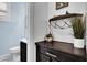 Stylish entryway featuring modern decor and a decorative accent cabinet at 640 Hayborn Meadows St, Las Vegas, NV 89138