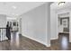 Bright hallway with wood floors leading to various rooms in the home at 640 Hayborn Meadows St, Las Vegas, NV 89138