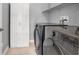 Laundry room features modern appliances and storage at 640 Hayborn Meadows St, Las Vegas, NV 89138