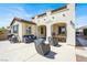 Charming patio with outdoor seating and lush landscaping at 640 Hayborn Meadows St, Las Vegas, NV 89138