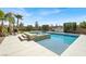 Sparkling pool and spa surrounded by lush landscaping at 640 Hayborn Meadows St, Las Vegas, NV 89138