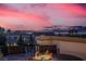 Enjoy rooftop patio views and a fire pit under a beautiful sunset at 640 Hayborn Meadows St, Las Vegas, NV 89138