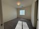 This bedroom has neutral carpet, white walls, and natural light from one window at 6546 Churnet Valley Ave, Las Vegas, NV 89139