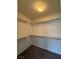 This is an empty walk-in closet with wire shelving and neutral carpet at 6546 Churnet Valley Ave, Las Vegas, NV 89139