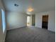 This main bedroom is spacious and bright, and has a view of the bathroom and closet at 6546 Churnet Valley Ave, Las Vegas, NV 89139