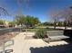 A well maintained neighborhood park with seating and green space at 6546 Churnet Valley Ave, Las Vegas, NV 89139