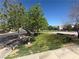 Lush neighborhood park featuring mature trees, green grass, and pleasant surroundings at 6546 Churnet Valley Ave, Las Vegas, NV 89139