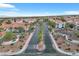 Aerial view of the community featuring lush landscaping and well-maintained streets at 725 Wheat Ridge Ln # 201, Las Vegas, NV 89145
