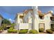 Attractive home featuring well-maintained landscaping and a private balcony at 725 Wheat Ridge Ln # 201, Las Vegas, NV 89145