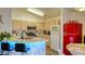 Bright kitchen with stainless steel appliances, marble counters, and a vintage-style refrigerator at 725 Wheat Ridge Ln # 201, Las Vegas, NV 89145