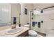 Clean bathroom with a glass shower enclosure and modern fixtures at 7349 Merimack Oaks St, Las Vegas, NV 89166