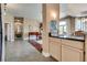 Open entryway flowing into the living room with a piano, formal dining room, and natural light at 7432 Tahoe Basin Dr, Las Vegas, NV 89129