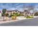 Well-maintained single-story home with a three-car garage and lush, mature landscaping at 7432 Tahoe Basin Dr, Las Vegas, NV 89129