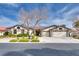 Charming single-story home with mature landscaping, three-car garage and inviting curb appeal at 7432 Tahoe Basin Dr, Las Vegas, NV 89129