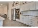 Kitchen featuring stainless steel appliances, light-colored cabinets, and updated countertops at 7432 Tahoe Basin Dr, Las Vegas, NV 89129