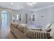 Inviting living room with a plush sectional sofa and open layout at 7695 Windy Meadow Ave, Las Vegas, NV 89178