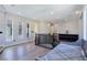 Spacious loft area with unique architectural details, ample natural light, and neutral finishes at 7695 Windy Meadow Ave, Las Vegas, NV 89178