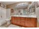 Bathroom with a double sink vanity, white bath tub, and neutral color walls at 784 Tossa De Mar Ave, Henderson, NV 89002