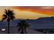 Expansive view of the city skyline, mountains and picturesque desert sky from the roof of a home in the community at 784 Tossa De Mar Ave, Henderson, NV 89002