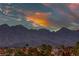 Majestic mountains serve as a stunning backdrop to this community view, complemented by a vibrant sky at 784 Tossa De Mar Ave, Henderson, NV 89002