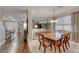 Open-concept dining area showcasing a view of living room and kitchen at 784 Tossa De Mar Ave, Henderson, NV 89002