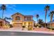 Charming two-story home with desert landscaping and a two-car garage under a beautiful sky at 784 Tossa De Mar Ave, Henderson, NV 89002