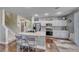 This well-equipped kitchen features an island, stainless appliances, and ample cabinet space at 784 Tossa De Mar Ave, Henderson, NV 89002