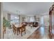 Inviting living area featuring a dining table and comfortable seating arrangement with natural light at 784 Tossa De Mar Ave, Henderson, NV 89002