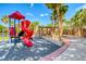 Community playground with play structures, picnic area and shade trees, offering a fun recreational space for children and families at 784 Tossa De Mar Ave, Henderson, NV 89002