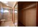 A view inside the bathroom closet with shower in the background at 7913 Sailboat Ln, Las Vegas, NV 89145